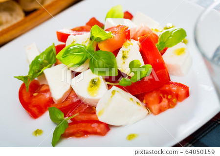 Light salad with young cheese Light salad with young cheese 64050159