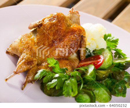 Grilled partridge with steamed vegetables Grilled partridge with steamed vegetables 64050232
