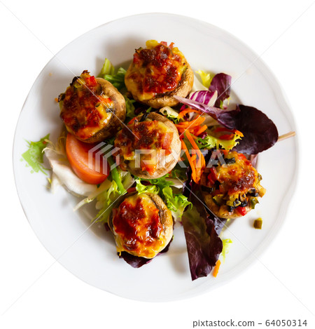 Mushrooms stuffed with vegetables and ham, baked with mozzarella 64050314