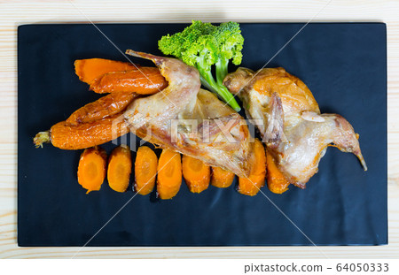 Teriyaki partridge with grilled carrots Teriyaki partridge with grilled carrots 64050333