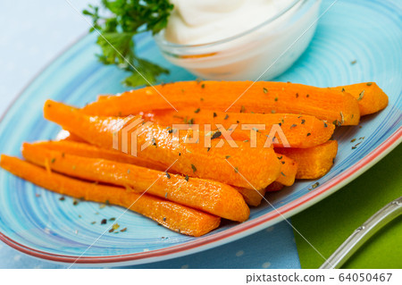 Carrot sticks with sour cream sauce Carrot sticks with sour cream sauce 64050467