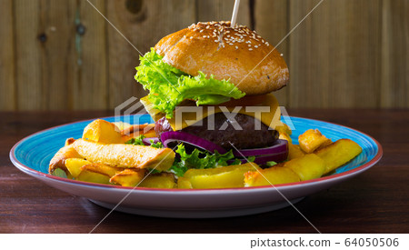 Heeseburger with beef, tomato, cheese, cucumber and french fries 64050506