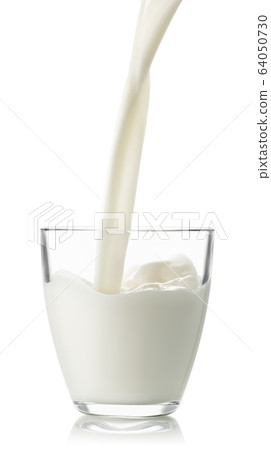 milk pouring into glass 64050730
