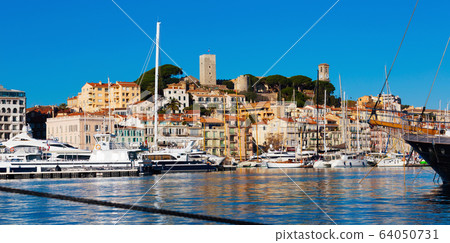 Yachts moored in port of Cannes 64050731