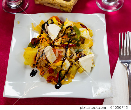 Warm salad of baked potatoes, vegetables and soft cheese Warm salad of baked potatoes, vegetables and soft cheese 64050745
