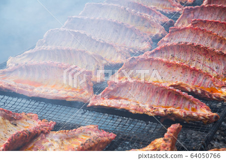 Ruddy pork ribs with a crust Ruddy pork ribs with a crust 64050766