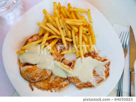 Pork steaks with fries 64050883