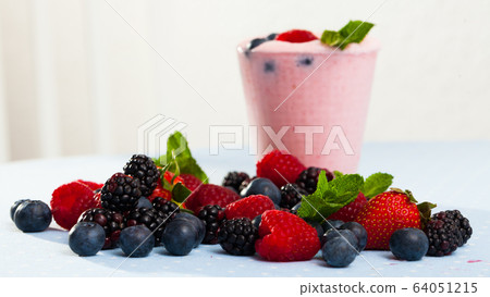 Smoothie with milk and berries Smoothie with milk and berries 64051215