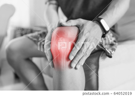 Joint pain, Arthritis and tendon problems. a man touching nee at pain point Joint pain, Arthritis and tendon problems. a man touching nee at pain point 64052019