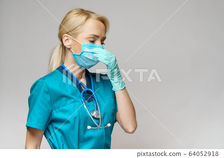 medical doctor nurse woman with stethoscope wearing protective mask and rubber or latex gloves medical doctor nurse woman with stethoscope wearing protective mask and rubber or latex gloves 64052918