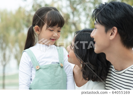 Portrait of parent and child playing outdoors Portrait of parent and child playing outdoors 64055169