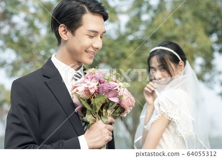 Couple wedding portrait outdoors Couple wedding portrait outdoors 64055312