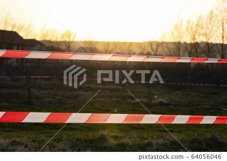 quarantine tape on field stay at home coronavirus quarantine tape on field stay at home coronavirus 64056046