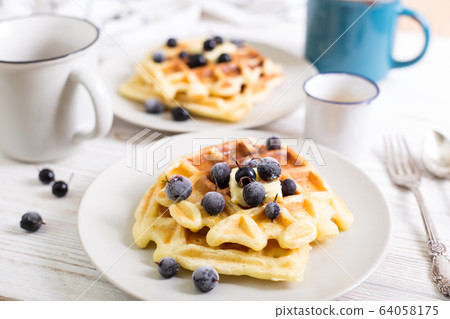 Belgian waffles and tea 64058175
