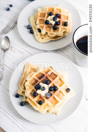 Belgian waffles and tea Belgian waffles and tea 64058180