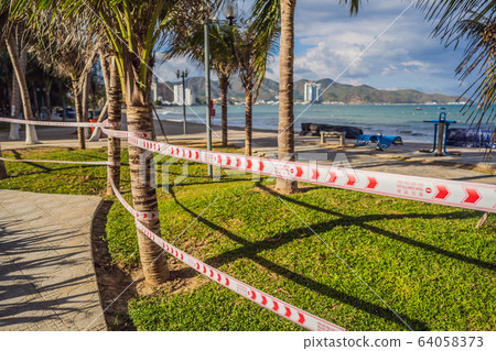 Corona Virus threat closes beaches and public places in many countries. The inscription NOT ALLOWED 64058373