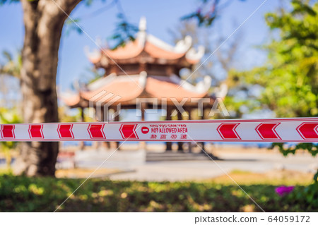 Corona Virus threat closes beaches and public places in many countries. The inscription NOT ALLOWED 64059172