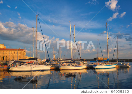 Yachts and boats in picturesque old port of Chania, Crete island. Greece Yachts and boats in picturesque old port of Chania, Crete island. Greece 64059320
