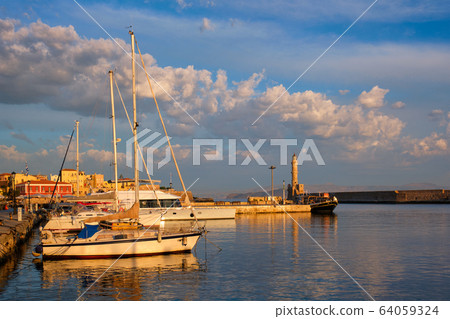 Yachts and boats in picturesque old port of Chania, Crete island. Greece Yachts and boats in picturesque old port of Chania, Crete island. Greece 64059324