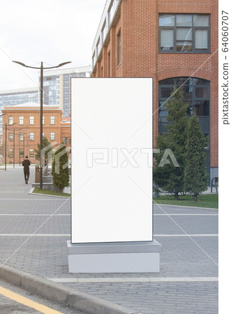 Blank white vertical pylon stand mock up brick building background 64060707