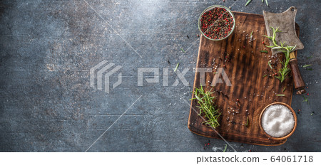 Top view of rectangular chopping board with preps 64061718
