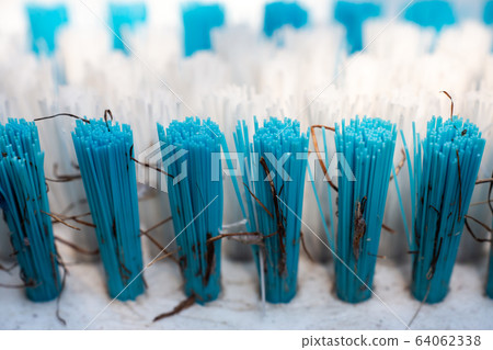 Dirty broom for cleaning Floor, Close up & Macro shot, Selective focus Dirty broom for cleaning Floor, Close up & Macro shot, Selective focus 64062338