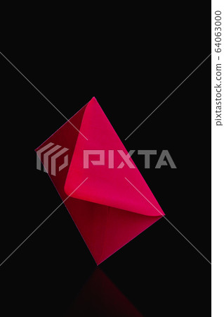Levitating red envelope on glass table. Levitating red envelope on glass table. 64063000