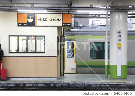 Standing eating noodle shop at the station 64064400