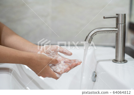 Washing hands rubbing with soap proper technique 64064812