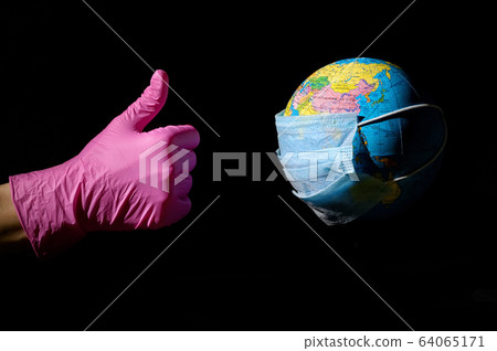 Female Hand And Earth With Mask Female Hand And Earth With Mask 64065171