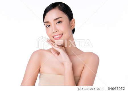 Beautiful Young Asian Woman with Clean Fresh Skin. Face care, Facial treatment, Cosmetology, beauty Beautiful Young Asian Woman with Clean Fresh Skin. Face care, Facial treatment, Cosmetology, beauty 64065952