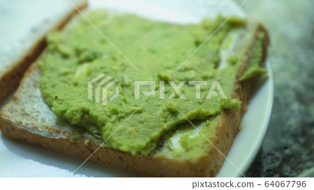 Healthy avocado toast for breakfast or lunch 64067796