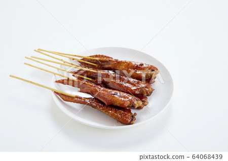 Thai food with grilled chicken wings on white 64068439