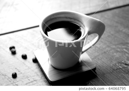 Black and white small coffee cup of expresso with 64068795