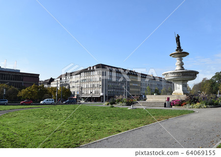 Cityscape in front of Würzburg Central Station, Germany 64069155
