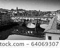 Florence, Italy - 2020. View of bridge Ponte Vecchio over Arno river. 64069307
