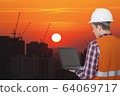 Engineer builder with laptop computer at 64069717