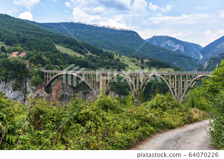 Durdevica bridge in the mountains of Northern Montenegro 64070226