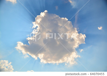 Sky and clouds. Sunlight passes through the clouds. Sky and clouds. Sunlight passes through the clouds. 64070455