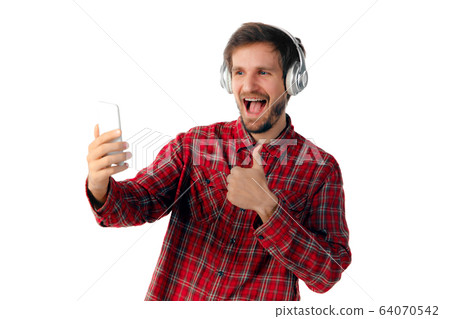 Man using smartphone isolated on white studio background 64070542