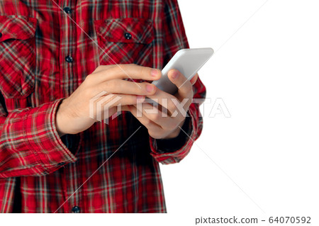 Close up of man using smartphone isolated on white studio background Close up of man using smartphone isolated on white studio background 64070592