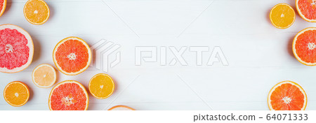 Different kinds of slice citrus fruits on white wooden background, Different kinds of slice citrus fruits on white wooden background, 64071333