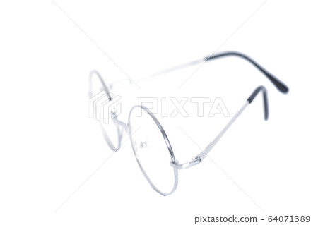 Folded round eyeglasses isolated on white Folded round eyeglasses isolated on white 64071389