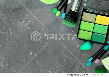 Creative flat lay of fashion bright nail polishes 64071490