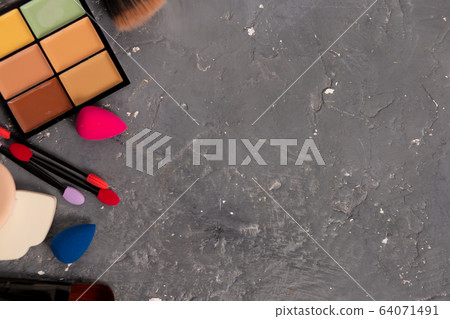 Creative flat lay of fashion bright nail polishes 64071491