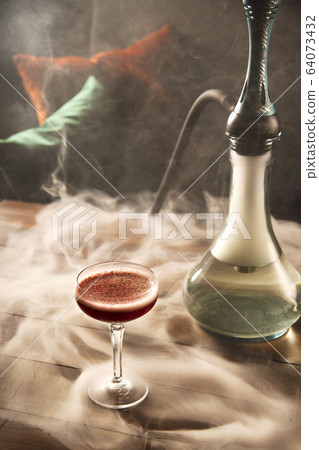 Harmful habit of smoking a hookah in a bar for Harmful habit of smoking a hookah in a bar for 64073432