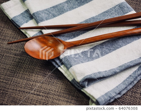 Korean traditional wooden spoon and wooden chopsticks background 64076308