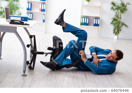 Young male employee in work accident concept 64076496