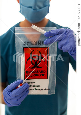Coronavirus test. Doctor close up. Medical clinic diagnostic. Doctor hospital protection mask. Covid-19 analyzing virus sample. Blood tube diagnosis. Test for coronavirus. 64077424