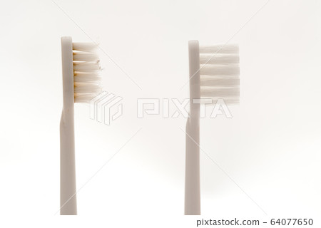 Used and new toothbrushes 64077650